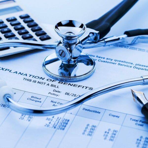 Elderly couple reviewing long-term healthcare insurance options