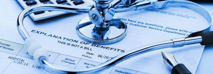 Elderly couple reviewing long-term healthcare insurance options